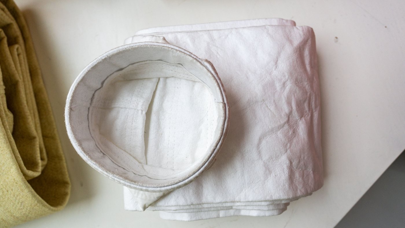 PPS vs PTFE Filter Bags: Which One Should You Choose?