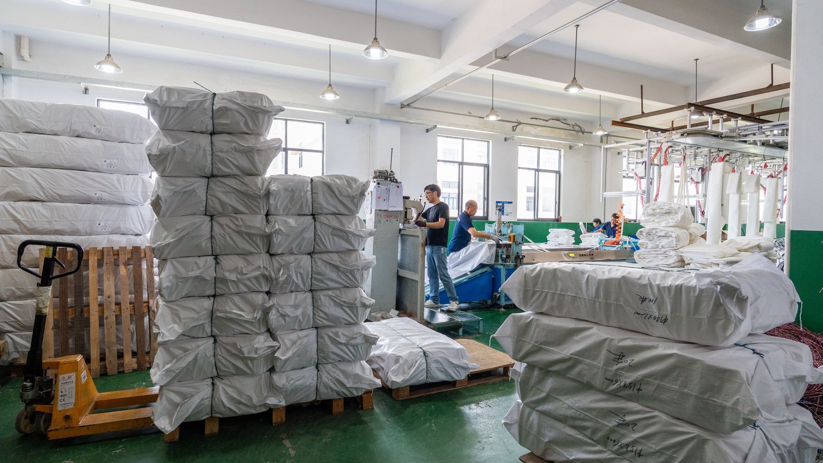 Packed needle felt filter bags in the Aramid factory workshop