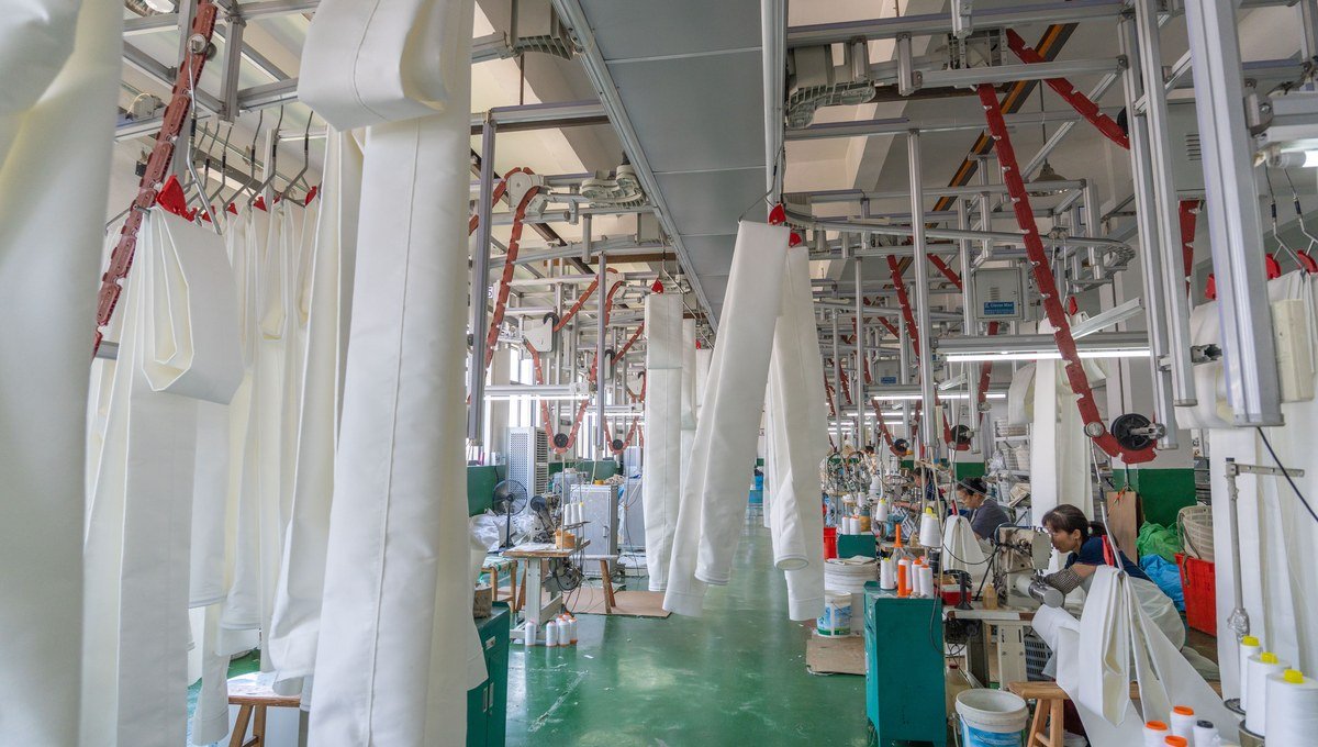 FMS filter bags sewn with controlled dimensions and reinforced constructions.