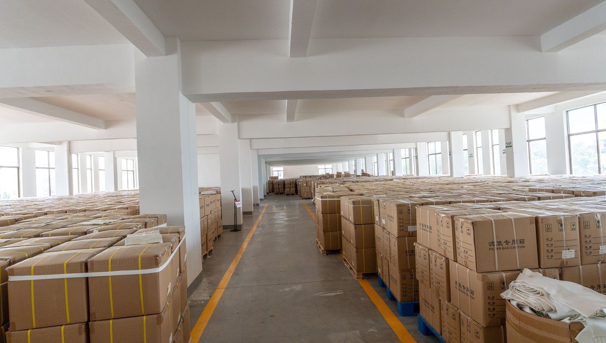 Polyester filter bags packed by size and quantity for efficient installation.