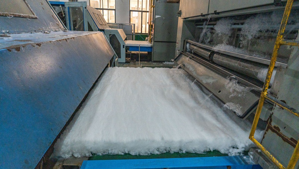 Polyester needle felt production and media preparation before bag sewing.