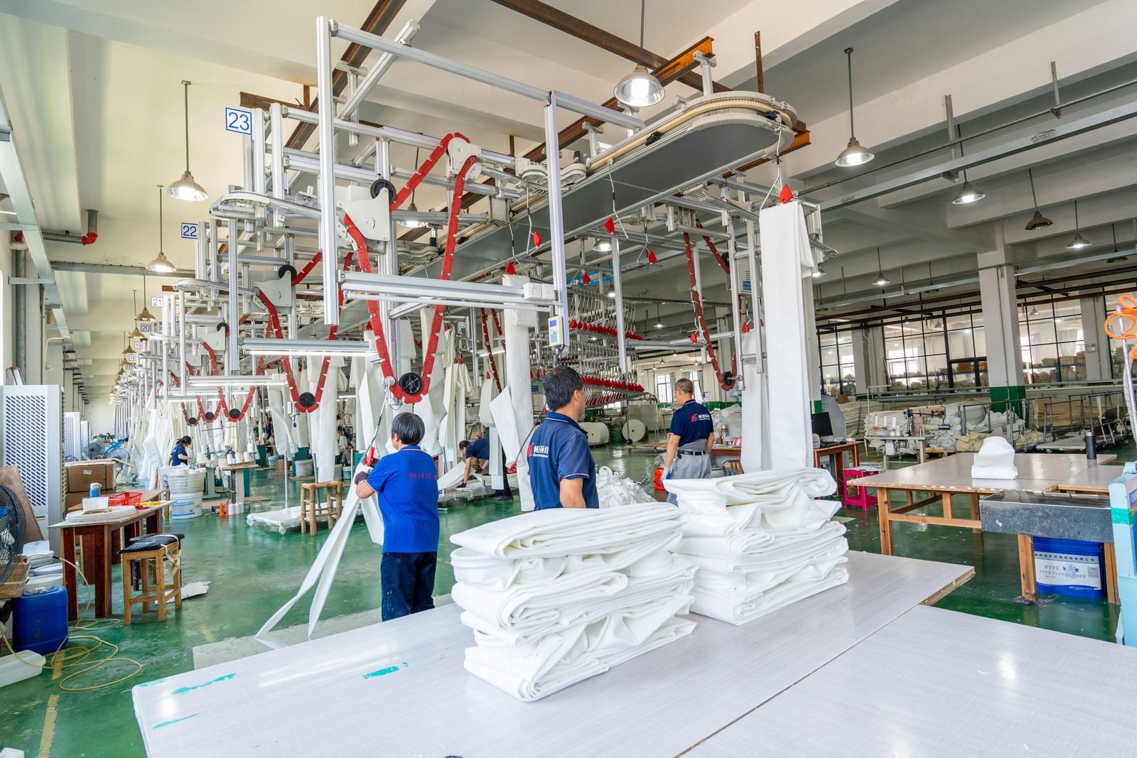 Sewing workshop for custom industrial dust collector filter bags.