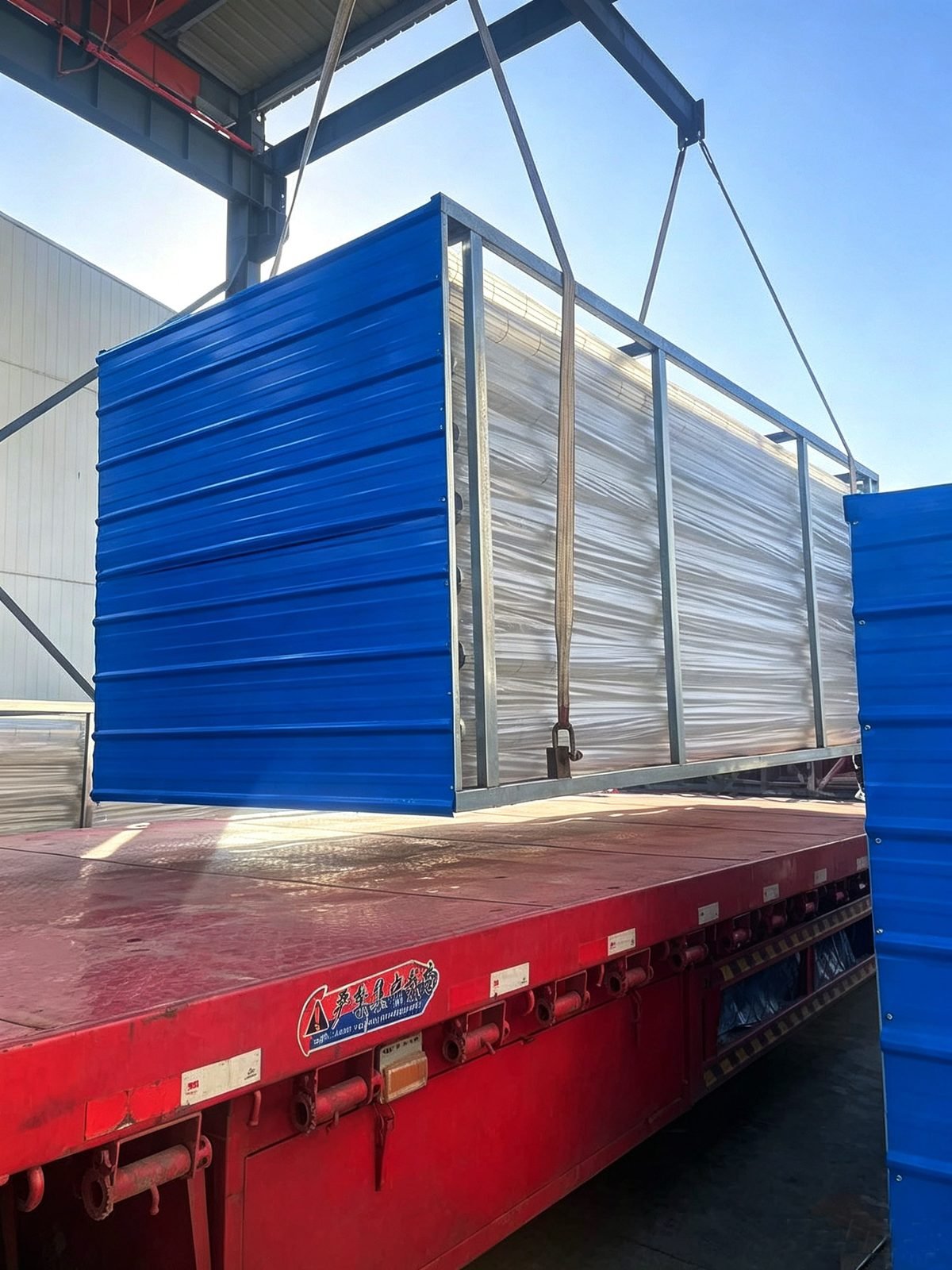 Filter cage packing module loaded onto flatbed truck