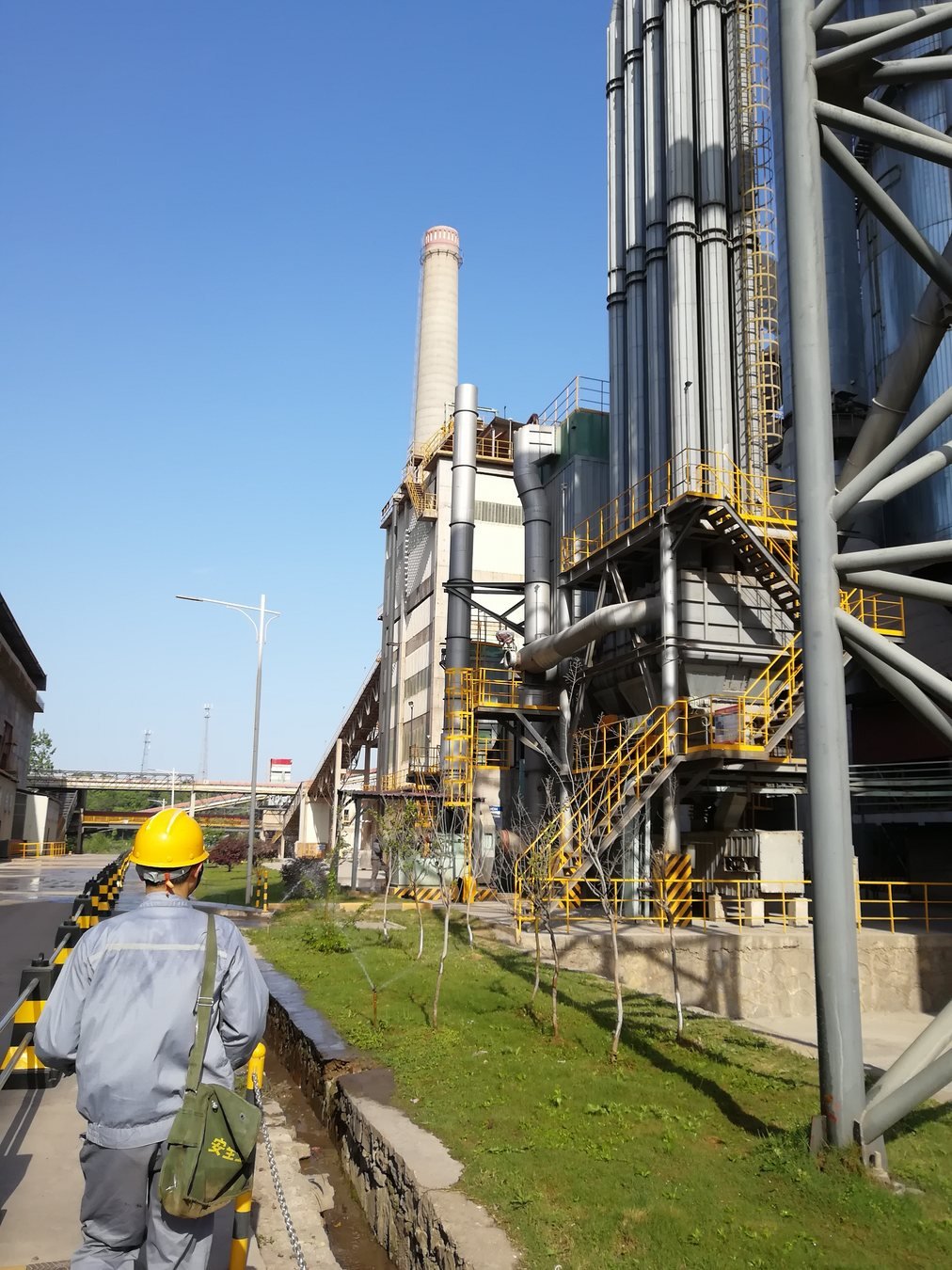 Industrial dust collection equipment at a cement plant site