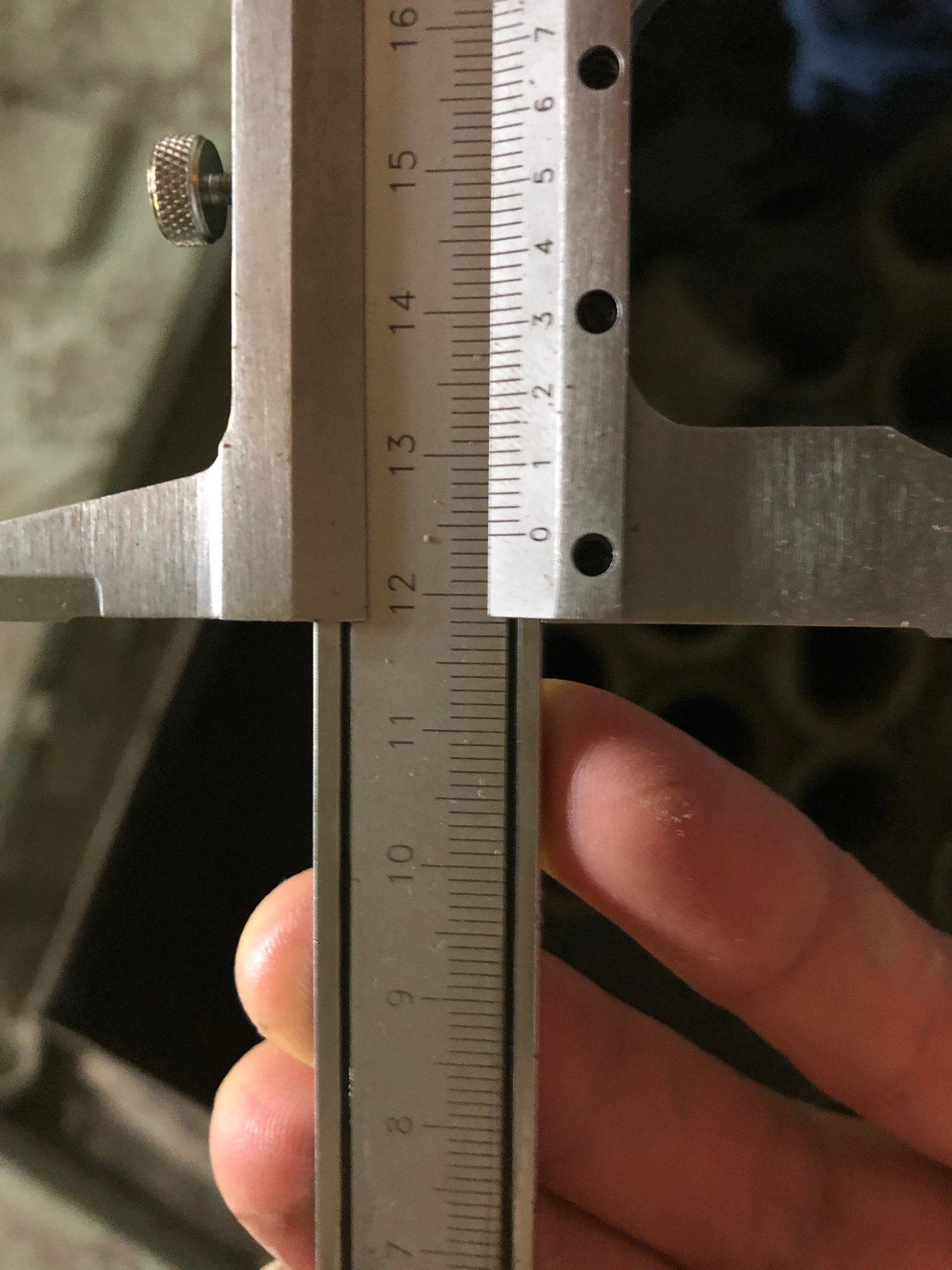 Actual tube-sheet opening measurement recorded during the service visit