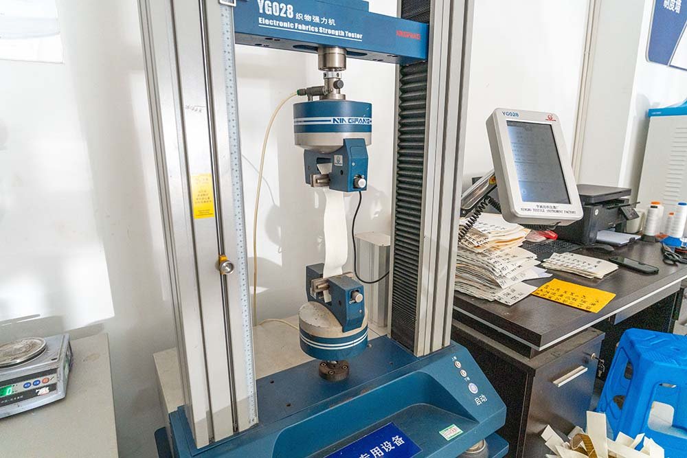 Fabric tensile strength testing equipment for filter media review