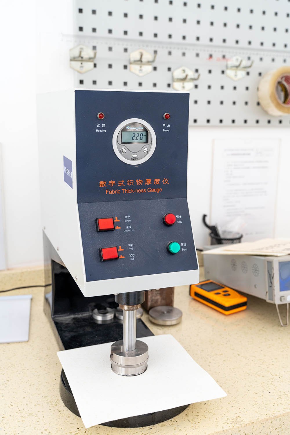Digital fabric thickness gauge used to check industrial filter media thickness